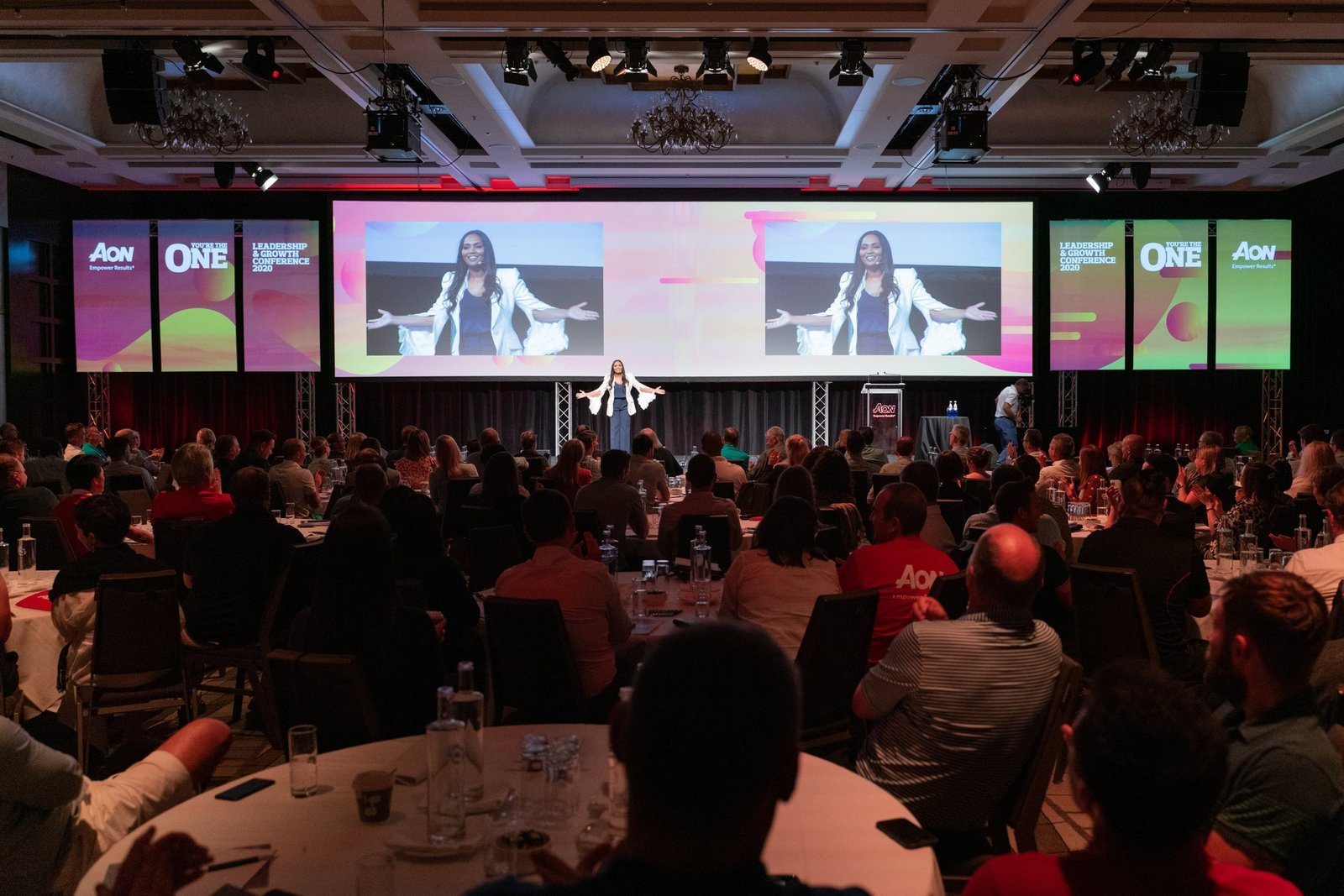 Norliza Norliza on stage at a global corporate conference — full ballroom audience including Microsoft, Dell and Lenovo conferences