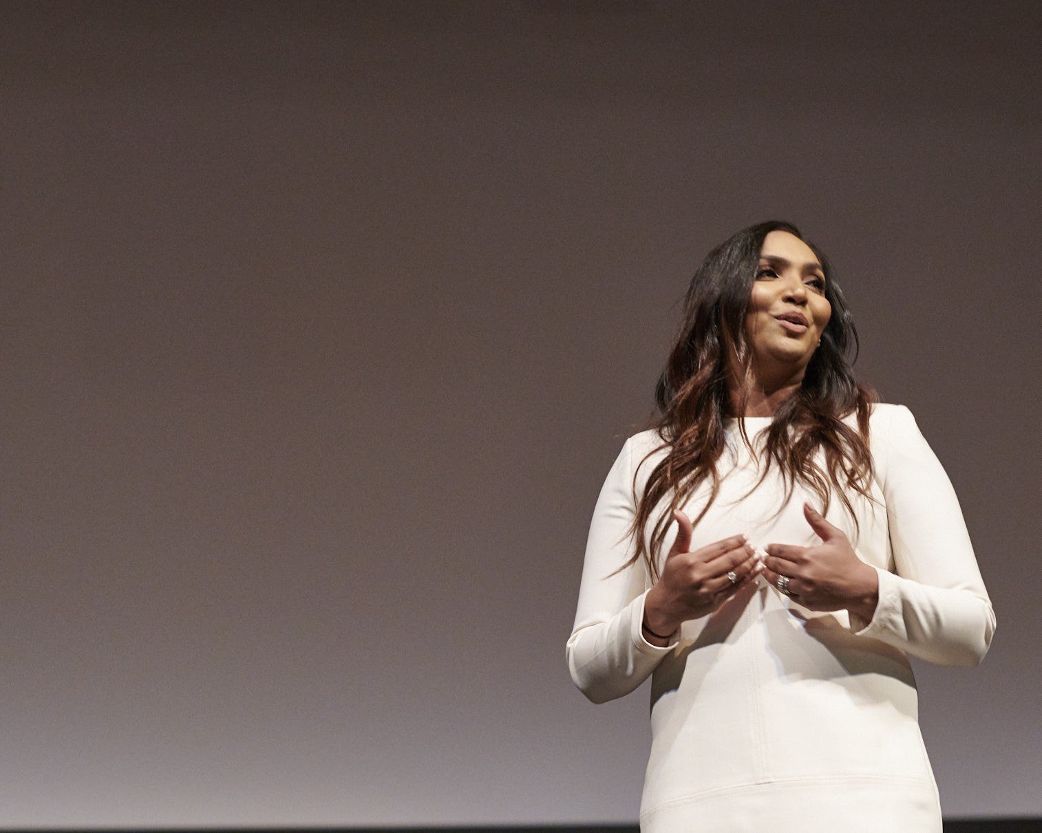 Norliza Pavlakos speaking on stage