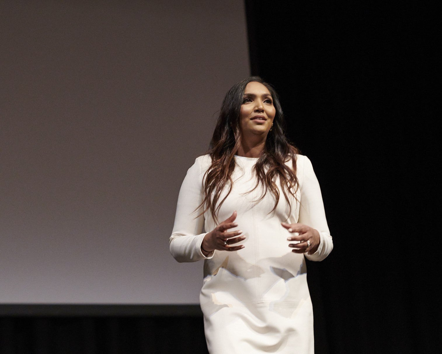 Norliza speaking on stage